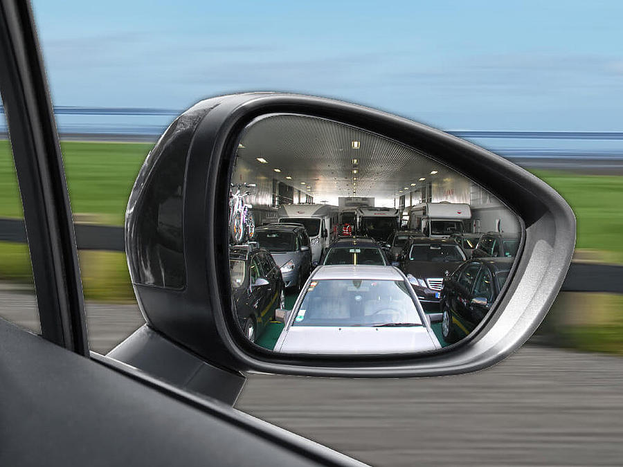 A look in the mirror on the car deck.