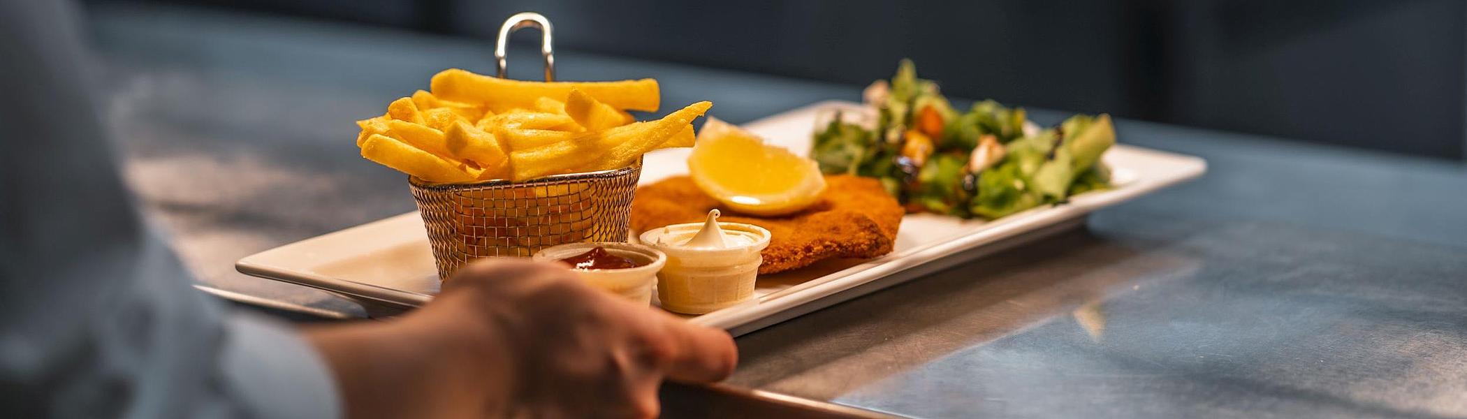 Schnitzel and chips from the on-board restaurant.